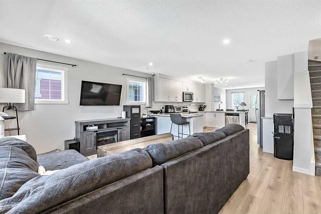 130 Cranbrook Square Se, Calgary, AB - Indoor Photo Showing Living Room