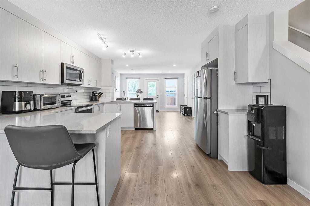 130 Cranbrook Square Se, Calgary, AB - Indoor Photo Showing Kitchen With Upgraded Kitchen