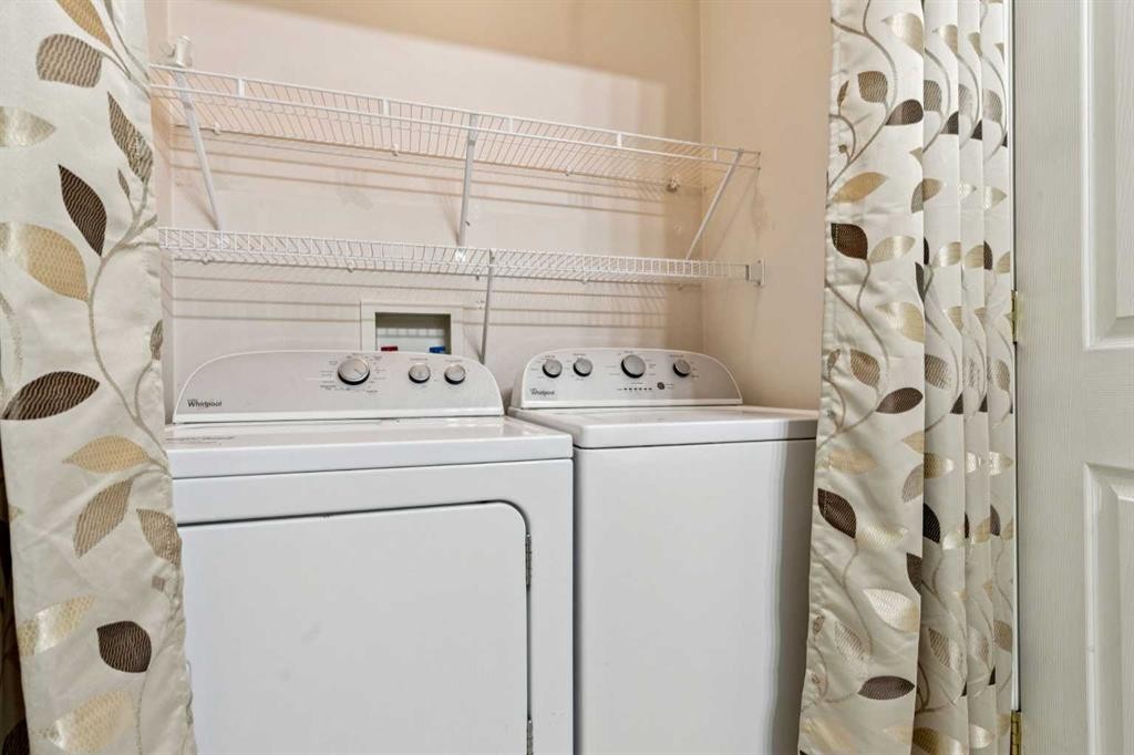 157 Hidden Creek Gardens Nw, Calgary, AB - Indoor Photo Showing Laundry Room
