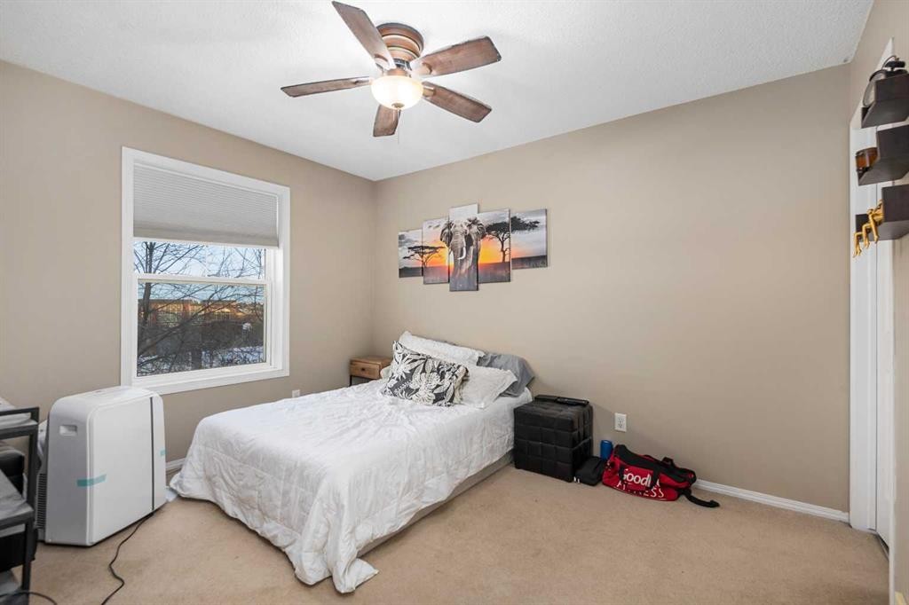 205 Mckenzie Towne Gate Se, Calgary, AB - Indoor Photo Showing Bedroom
