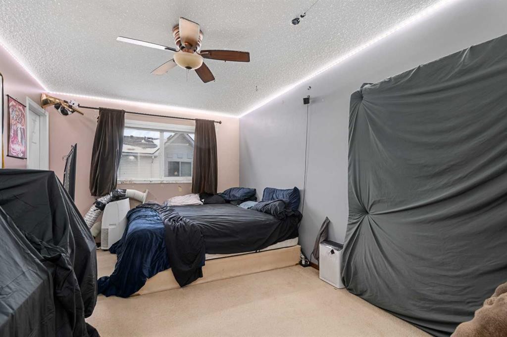 205 Mckenzie Towne Gate Se, Calgary, AB - Indoor Photo Showing Bedroom