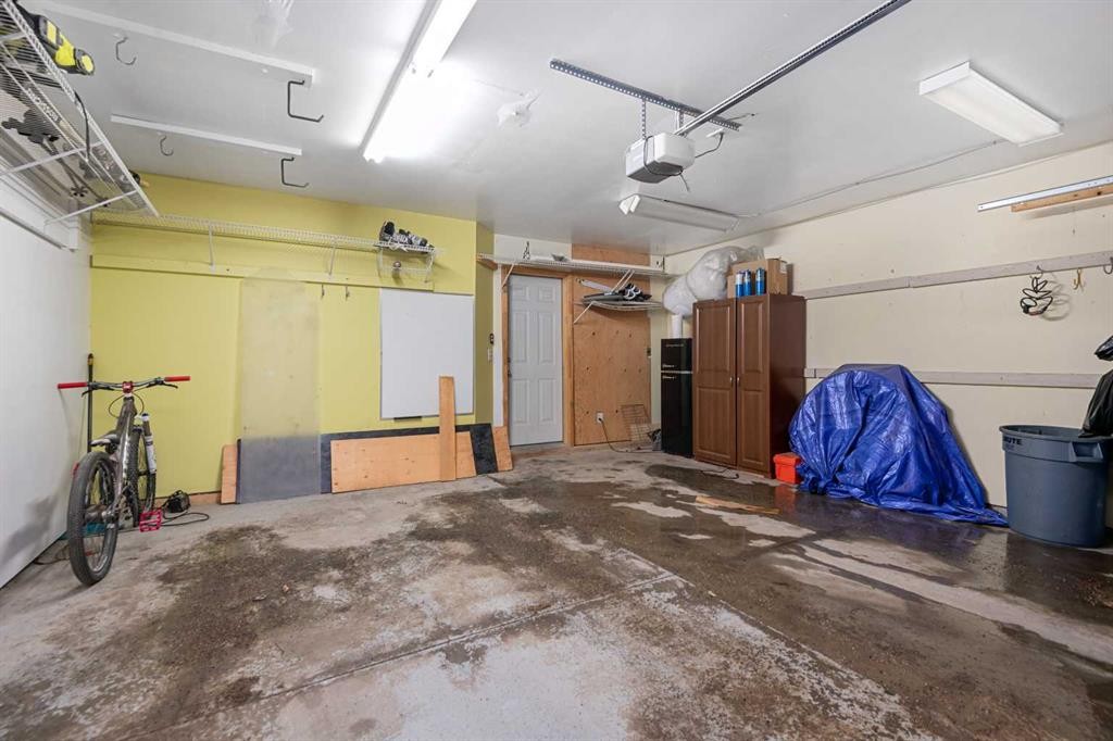 205 Mckenzie Towne Gate Se, Calgary, AB - Indoor Photo Showing Garage