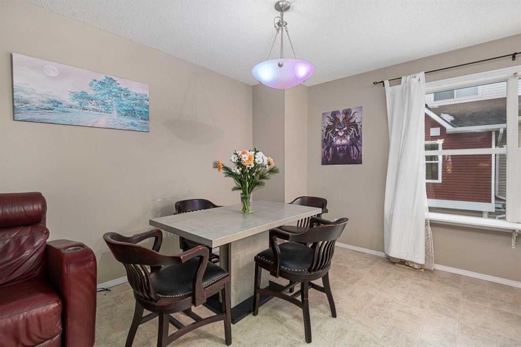 205 Mckenzie Towne Gate Se, Calgary, AB - Indoor Photo Showing Dining Room