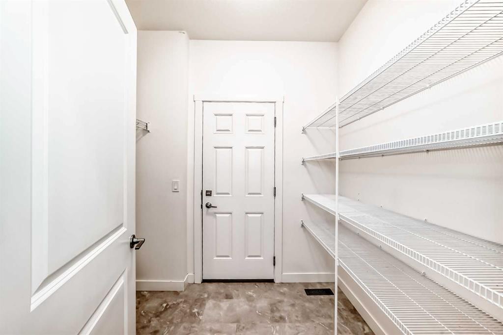 1449 Bayview Point Sw, Airdrie, AB - Indoor With Storage