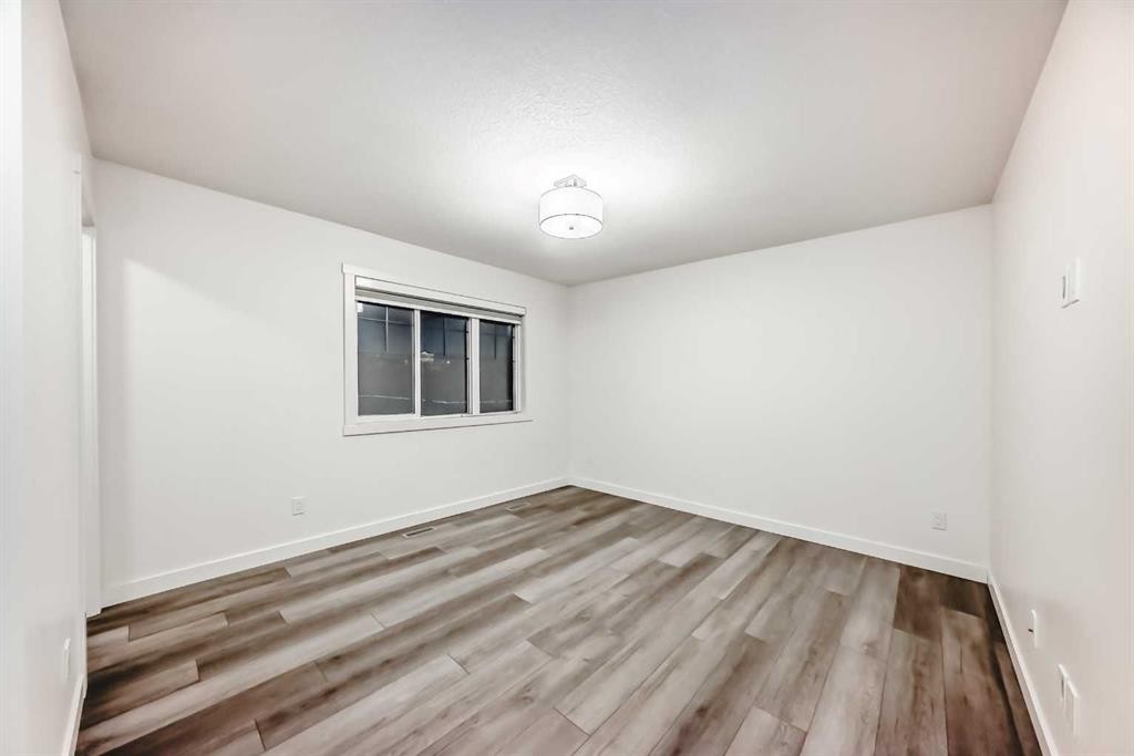 1449 Bayview Point Sw, Airdrie, AB - Indoor Photo Showing Other Room