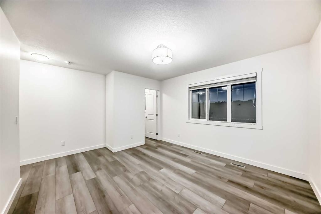 1449 Bayview Point Sw, Airdrie, AB - Indoor Photo Showing Other Room