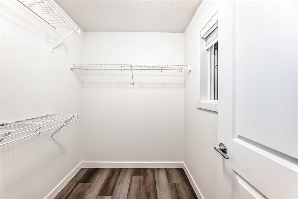 1449 Bayview Point Sw, Airdrie, AB - Indoor With Storage