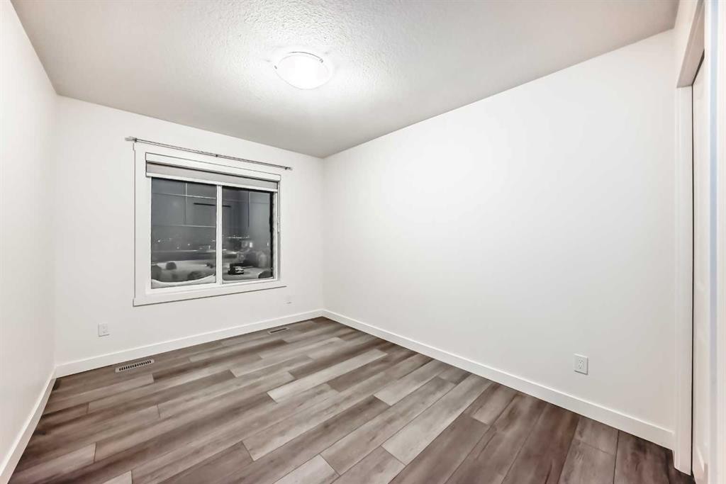 1449 Bayview Point Sw, Airdrie, AB - Indoor Photo Showing Other Room
