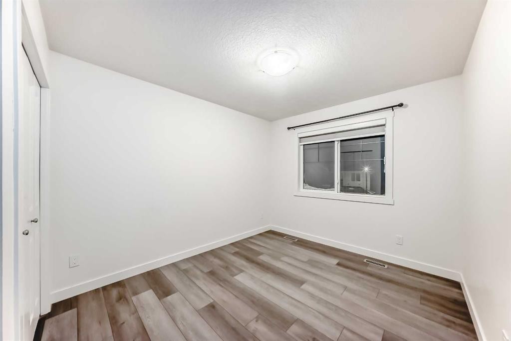 1449 Bayview Point Sw, Airdrie, AB - Indoor Photo Showing Other Room