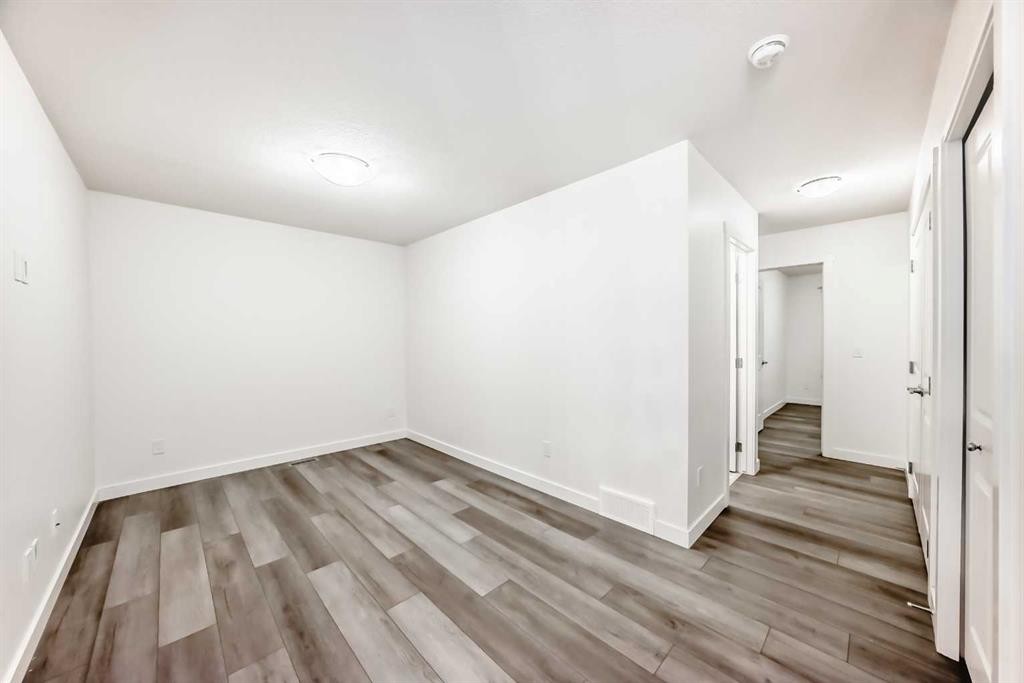 1449 Bayview Point Sw, Airdrie, AB - Indoor Photo Showing Other Room