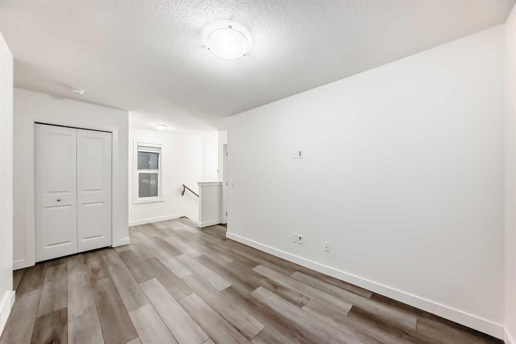 1449 Bayview Point Sw, Airdrie, AB - Indoor Photo Showing Other Room
