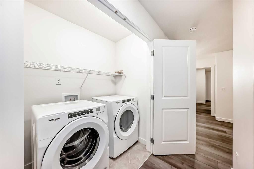 1449 Bayview Point Sw, Airdrie, AB - Indoor Photo Showing Laundry Room