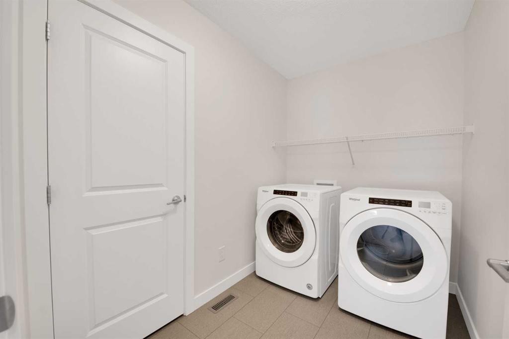 301 Sage Meadows Park Nw, Calgary, AB - Indoor Photo Showing Laundry Room