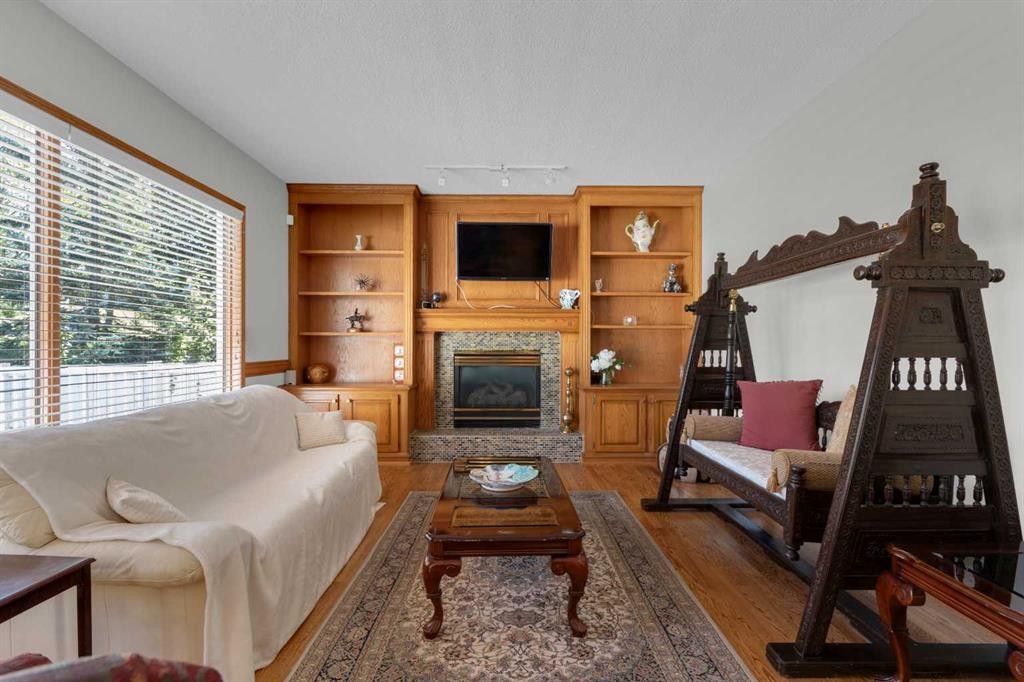 271 Mountain Park Drive Se, Calgary, AB - Indoor Photo Showing Living Room With Fireplace