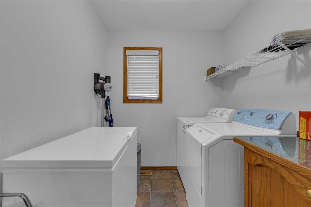 271 Mountain Park Drive Se, Calgary, AB - Indoor Photo Showing Laundry Room
