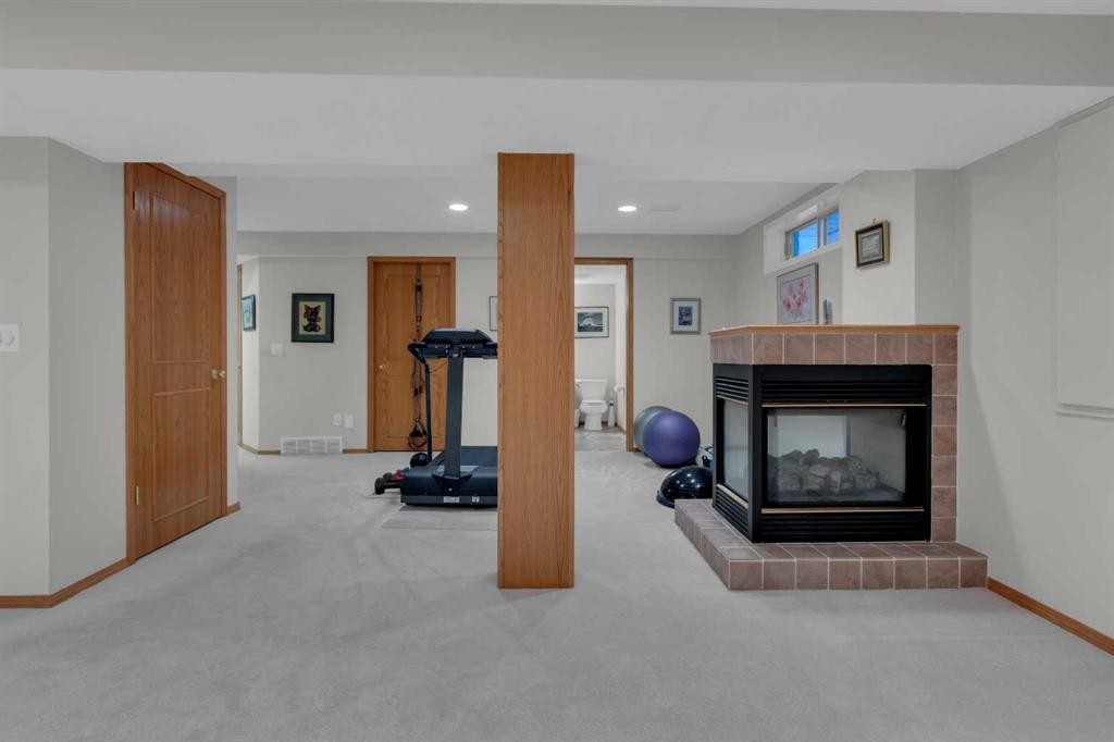 271 Mountain Park Drive Se, Calgary, AB - Indoor With Fireplace