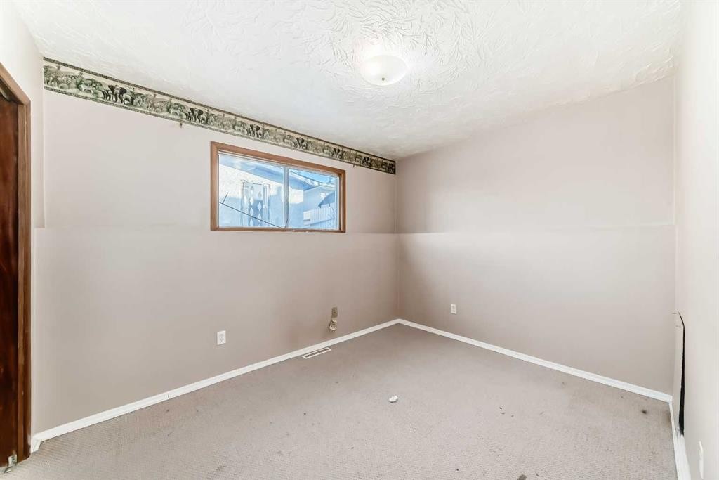 724 Millar Road Ne, Calgary, AB - Indoor Photo Showing Other Room