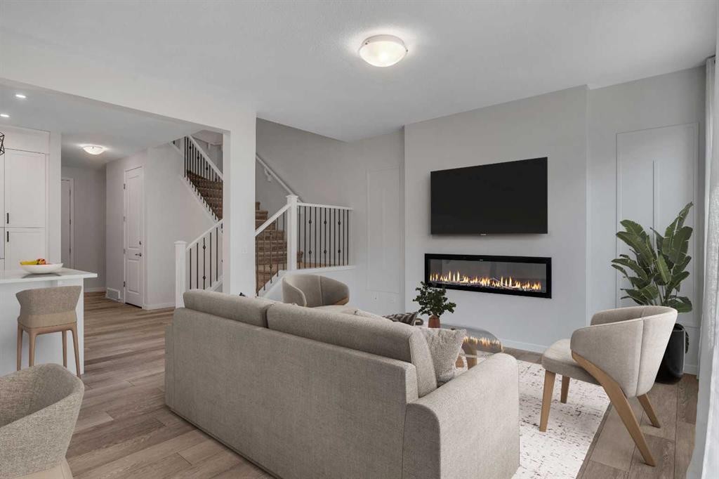 20 Rowley Common Nw, Calgary, AB - Indoor Photo Showing Living Room With Fireplace