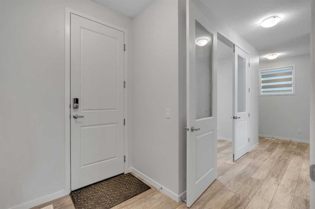 20 Rowley Common Nw, Calgary, AB - Indoor Photo Showing Other Room