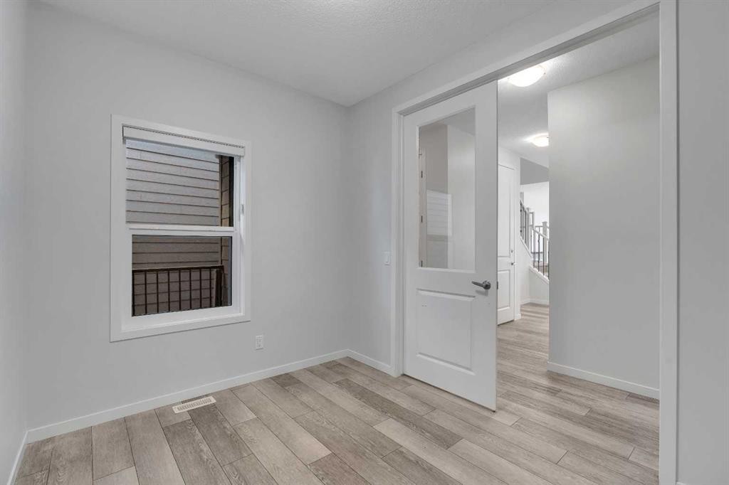 20 Rowley Common Nw, Calgary, AB - Indoor Photo Showing Other Room