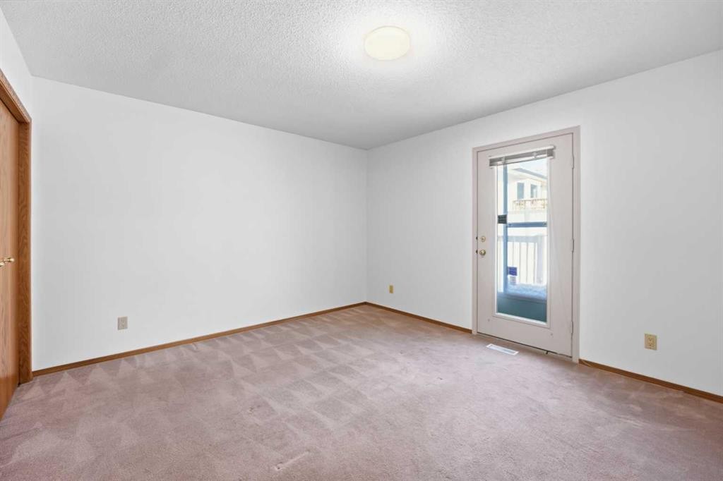 12 Arbour Cliff Close Nw, Calgary, AB - Indoor Photo Showing Other Room