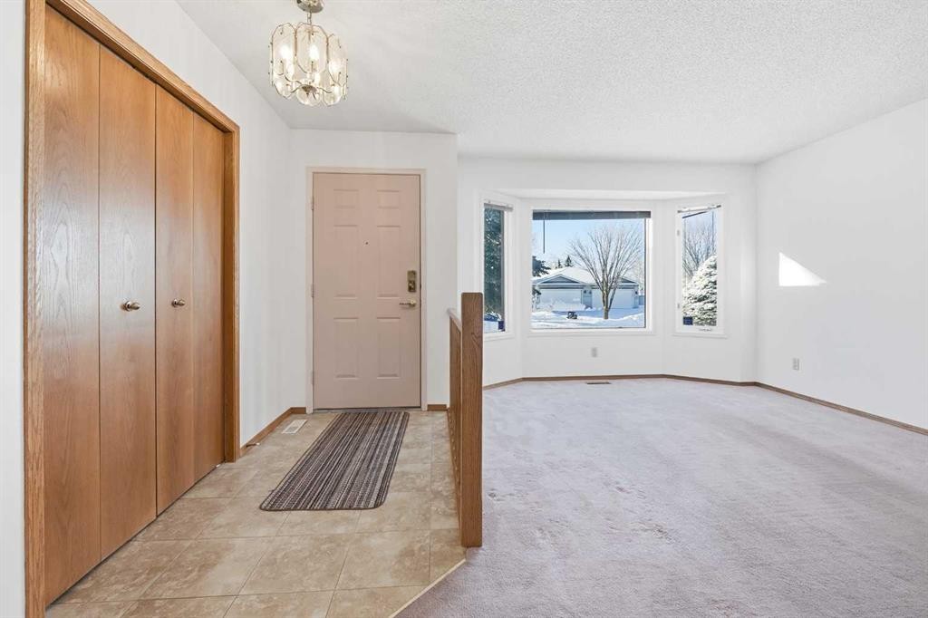 12 Arbour Cliff Close Nw, Calgary, AB - Indoor Photo Showing Other Room