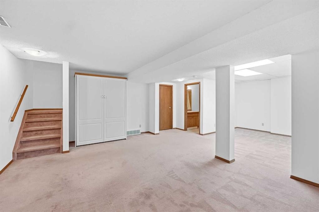 12 Arbour Cliff Close Nw, Calgary, AB - Indoor Photo Showing Other Room