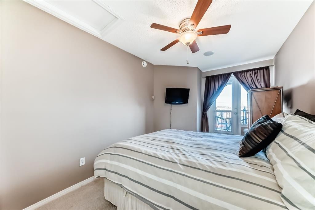 10-21 Mckenzie Towne Gate Se, Calgary, AB - Indoor Photo Showing Bedroom