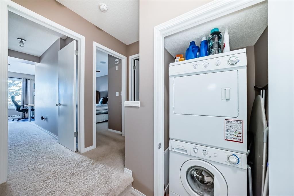 10-21 Mckenzie Towne Gate Se, Calgary, AB - Indoor Photo Showing Laundry Room