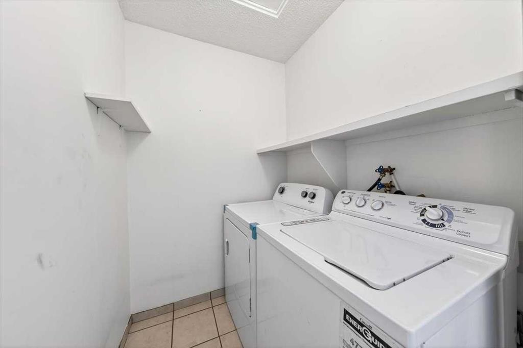 184 Falmere Way Ne, Calgary, AB - Indoor Photo Showing Laundry Room