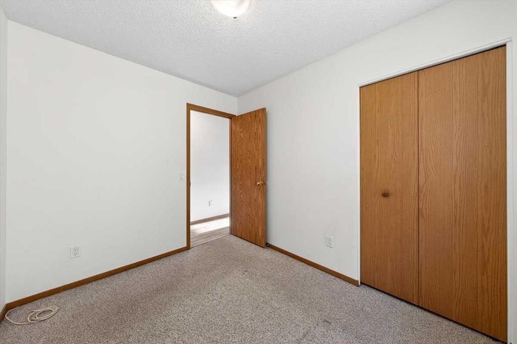 184 Falmere Way Ne, Calgary, AB - Indoor Photo Showing Other Room
