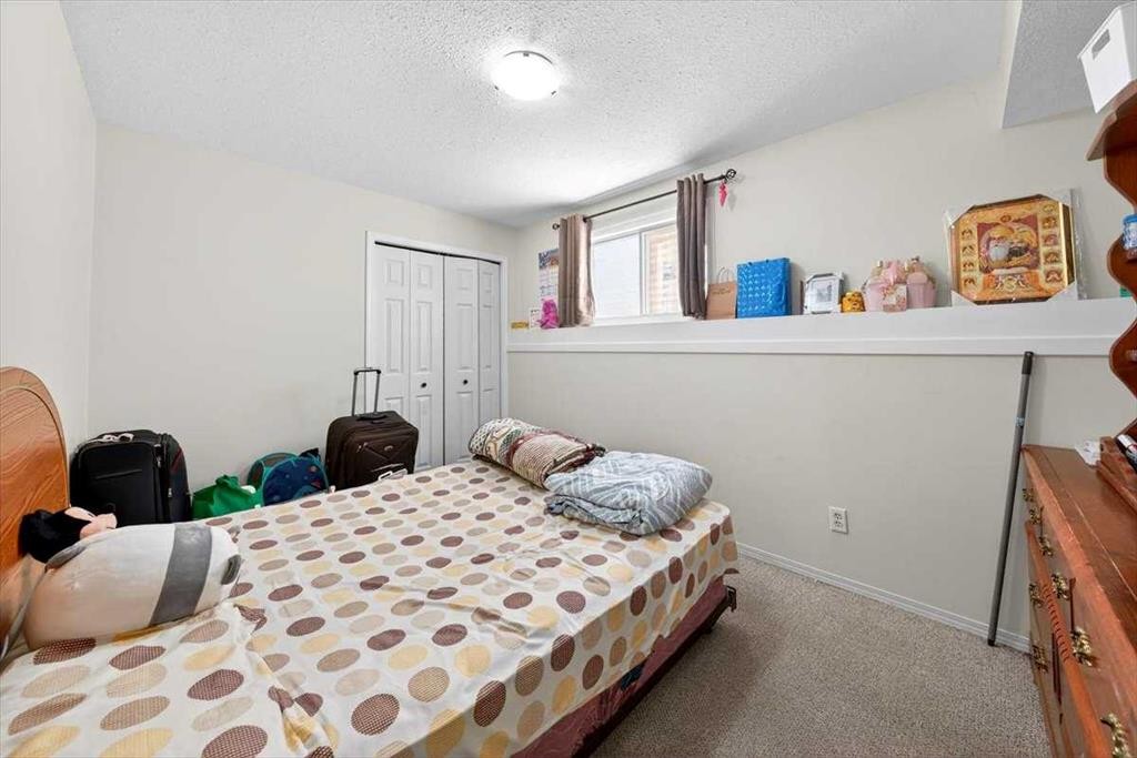 184 Falmere Way Ne, Calgary, AB - Indoor Photo Showing Bedroom
