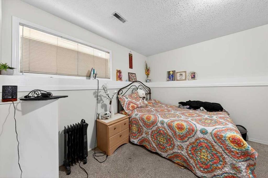 184 Falmere Way Ne, Calgary, AB - Indoor Photo Showing Bedroom