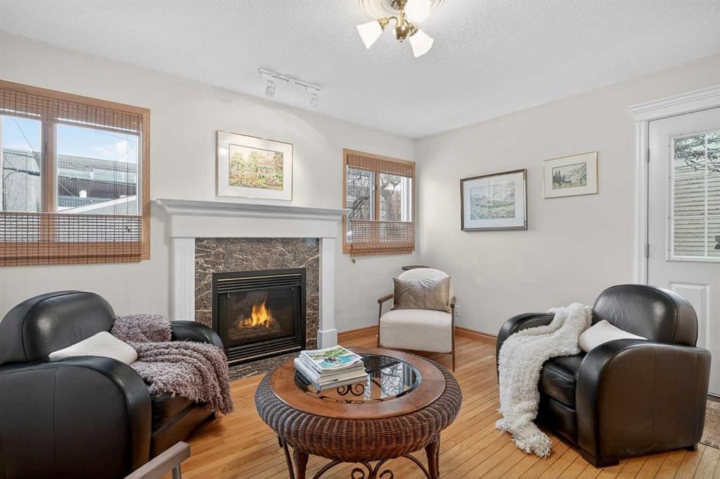 1720 11 Avenue Sw, Calgary, AB - Indoor Photo Showing Living Room With Fireplace