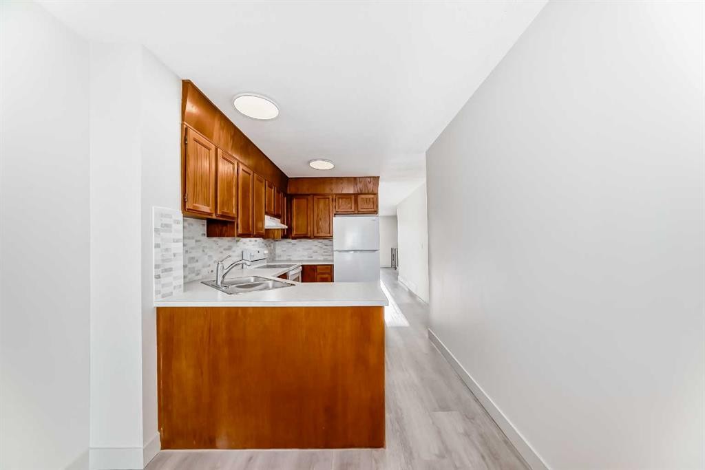 173 Castlebrook Way Ne, Calgary, AB - Indoor Photo Showing Kitchen With Double Sink