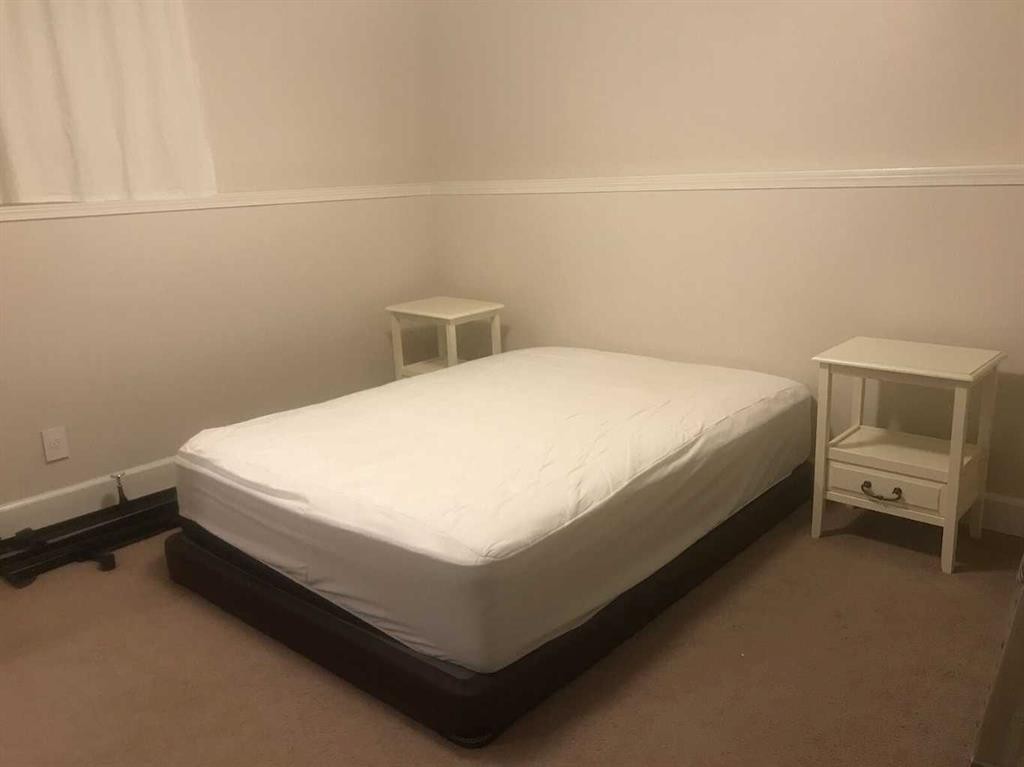 2135 Spiller Road Se, Calgary, AB - Indoor Photo Showing Bedroom