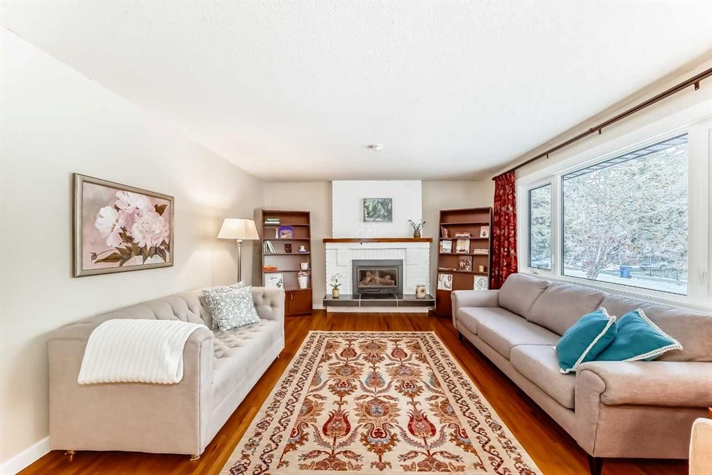 4803 Montana Drive Nw, Calgary, AB - Indoor Photo Showing Living Room With Fireplace