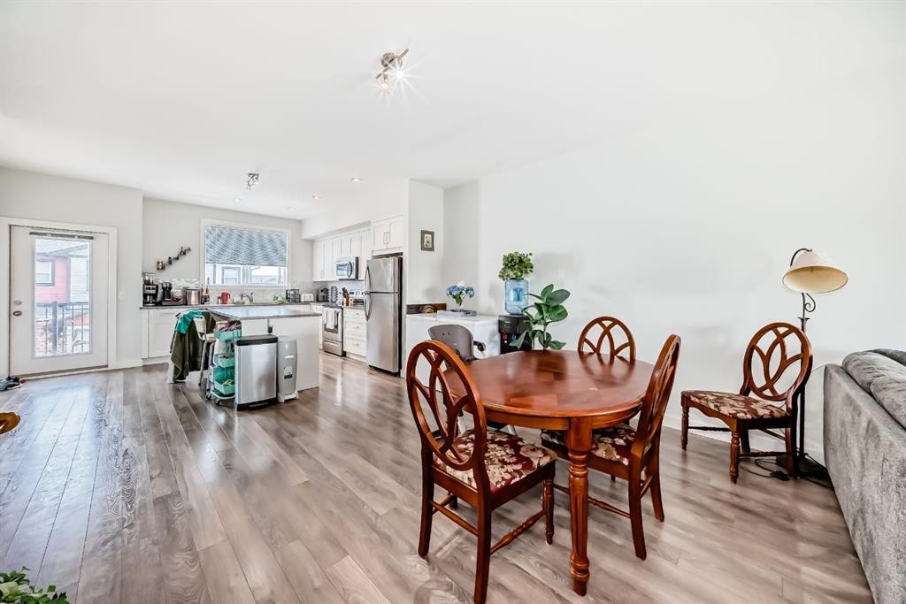 1703 Jumping Pound Common, Cochrane, AB - Indoor Photo Showing Dining Room
