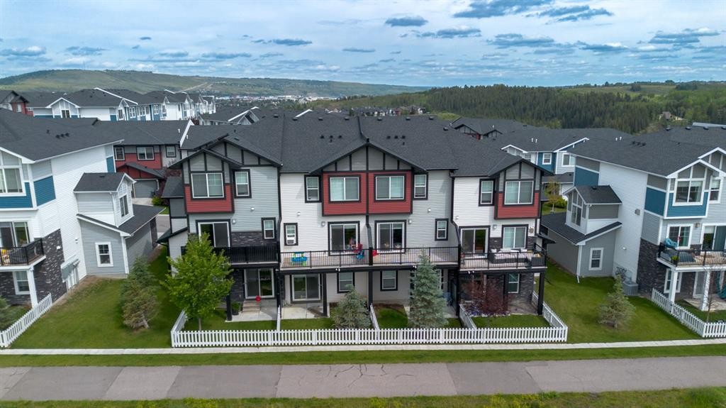 1703 Jumping Pound Common, Cochrane, AB - Outdoor With Facade