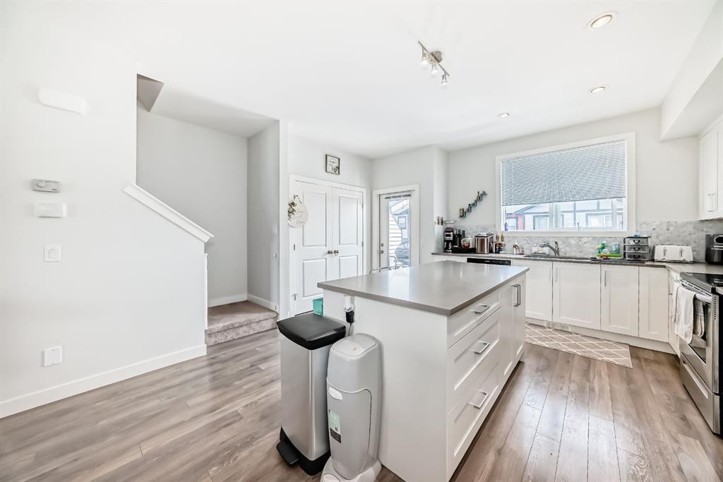 1703 Jumping Pound Common, Cochrane, AB - Indoor Photo Showing Kitchen