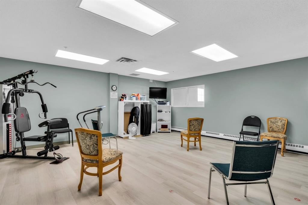 314-4500 50 Avenue, Olds, AB - Indoor Photo Showing Gym Room