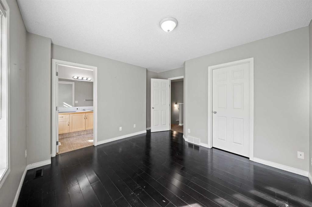 213 Copperfield Lane Se, Calgary, AB - Indoor Photo Showing Other Room