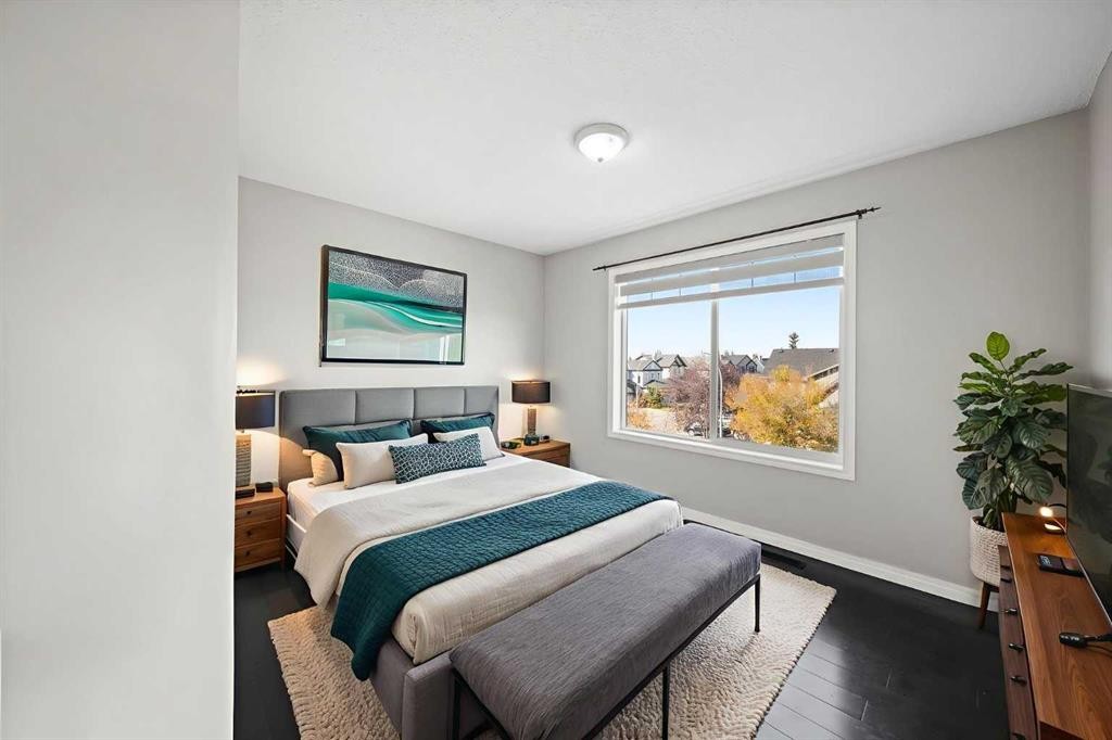 213 Copperfield Lane Se, Calgary, AB - Indoor Photo Showing Bedroom