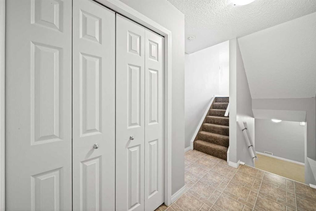 213 Copperfield Lane Se, Calgary, AB - Indoor Photo Showing Other Room