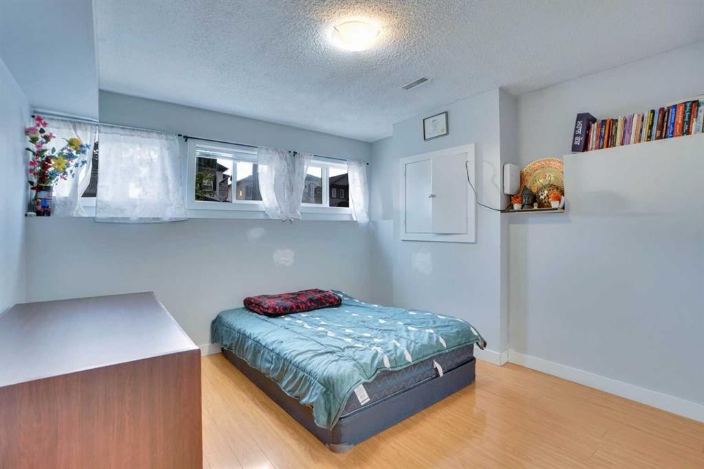 62 Taracove Estate Drive Ne, Calgary, AB - Indoor Photo Showing Bedroom