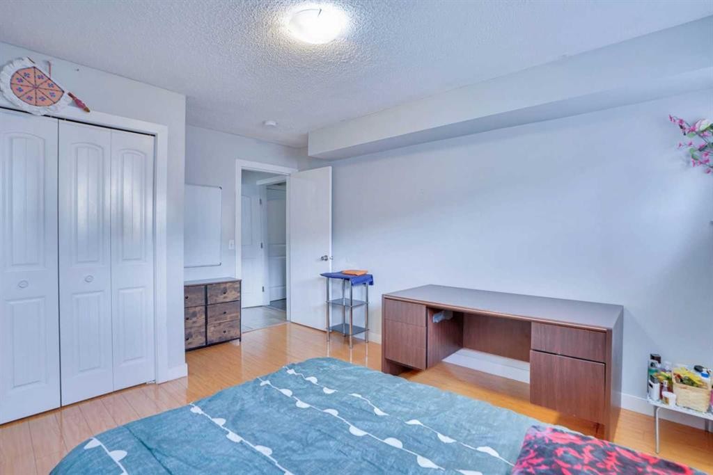 62 Taracove Estate Drive Ne, Calgary, AB - Indoor Photo Showing Bedroom