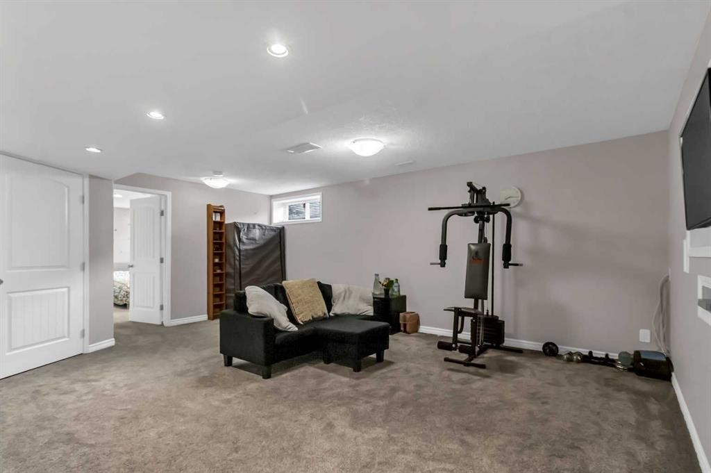 178 Evansmeade Common Nw, Calgary, AB - Indoor Photo Showing Gym Room