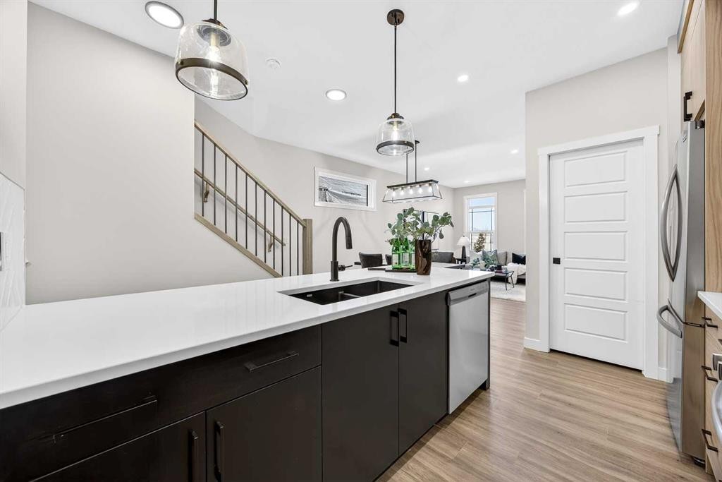 306 Alpine Boulevard, Calgary, AB - Indoor Photo Showing Kitchen With Double Sink With Upgraded Kitchen