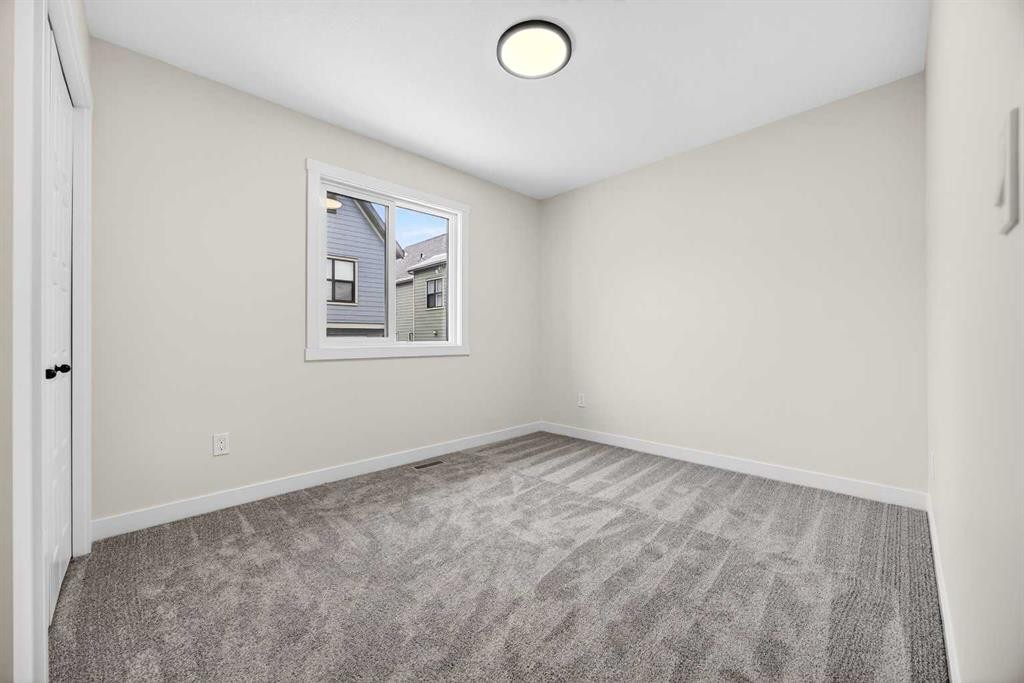 306 Alpine Boulevard, Calgary, AB - Indoor Photo Showing Other Room