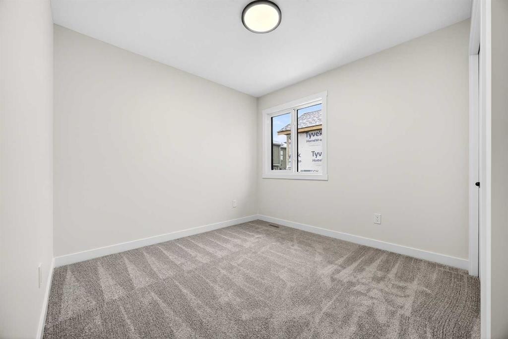 306 Alpine Boulevard, Calgary, AB - Indoor Photo Showing Other Room
